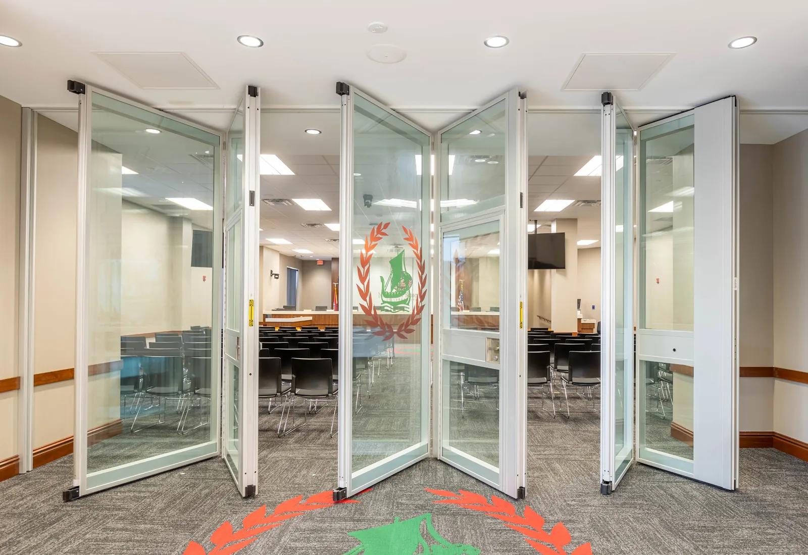 Folding glass wall system